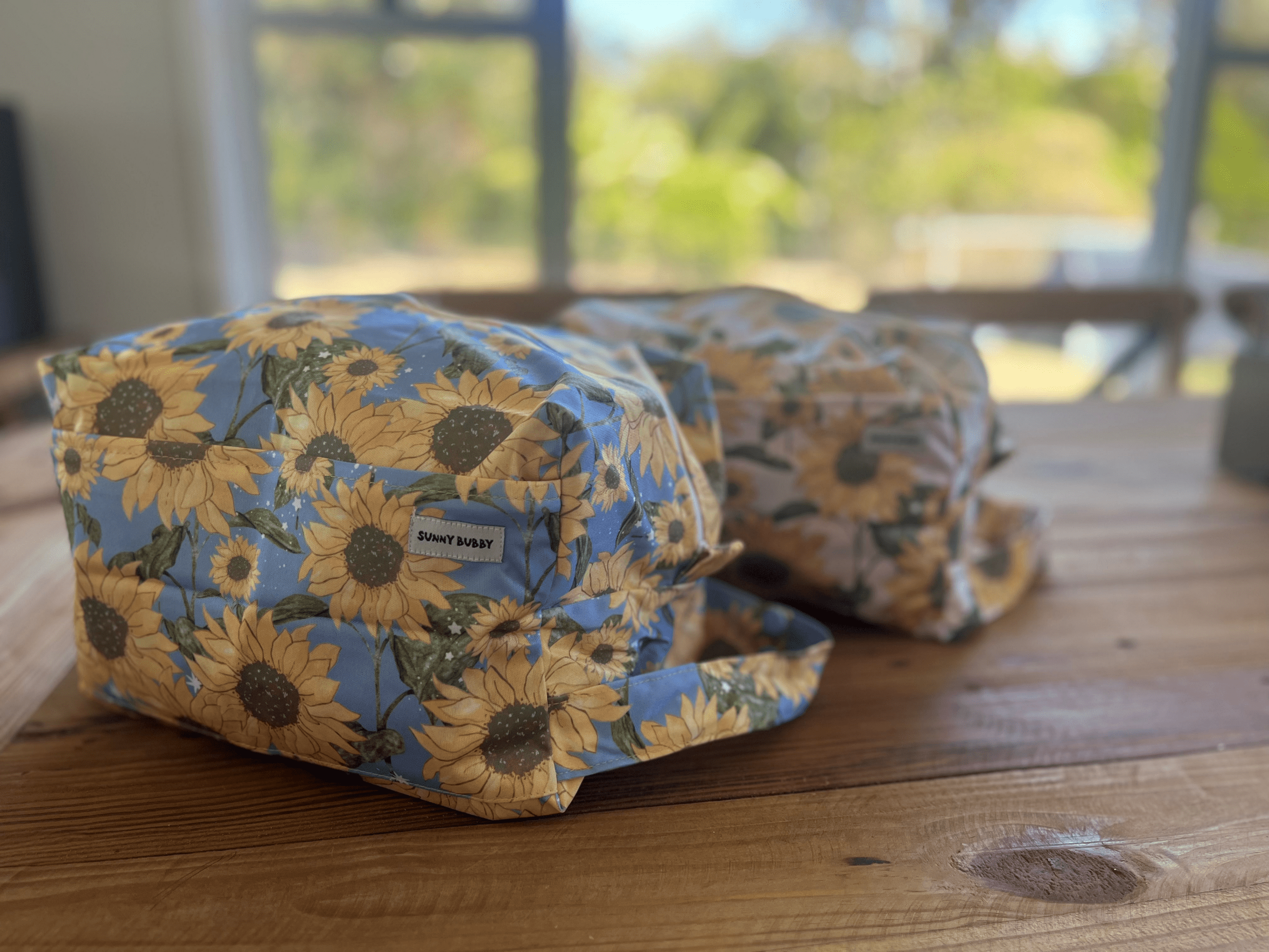 Blue Sunflowers Nappy Wet Bag POD with side zip - Image 5